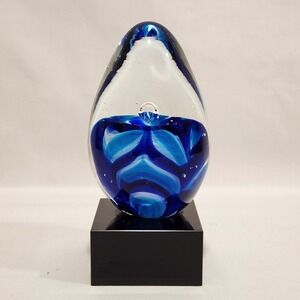 Art Glass Blue Swirl Egg Paperweight Sculpture on Black Pedestal Base